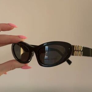 Stylish Black Sunglasses with Gold Accents